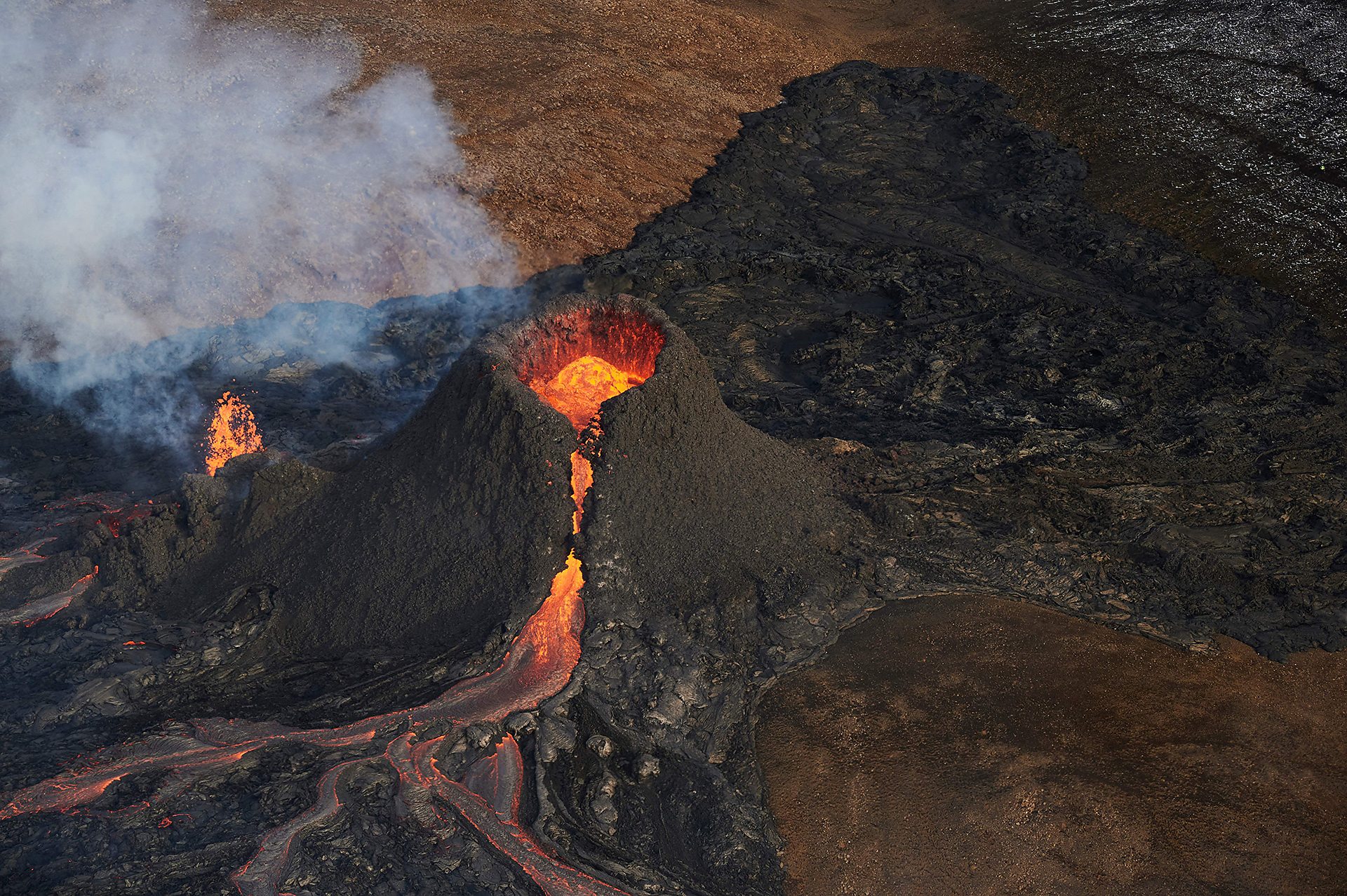 A dramatic flight over a red-hot volcano in Iceland