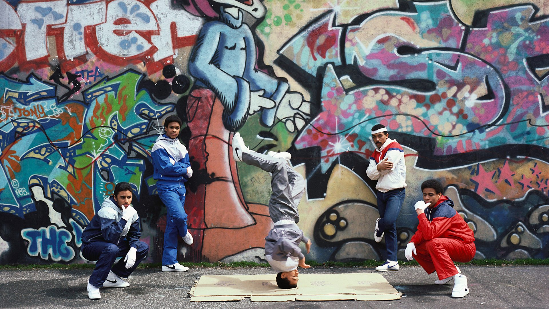 Five breakdancing teenagers in 1984