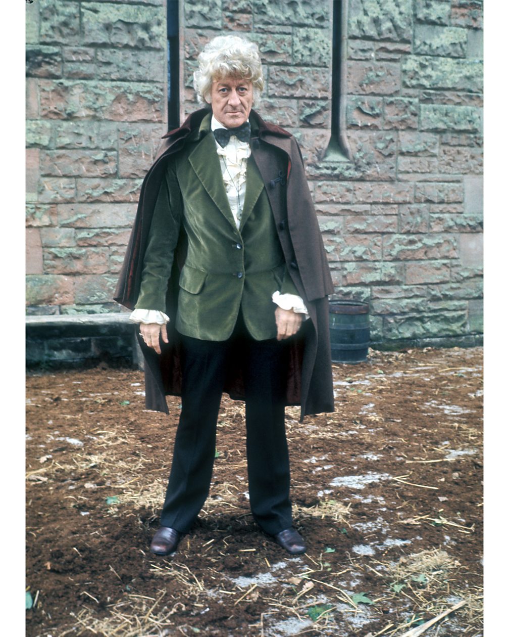 Jon Pertwee's dandyish aesthetic in the early 70s chimed with the retro fashions of the time (Credit: BBC)